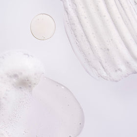 ORIBE lather texture close-up demonstrating gentle cleansing action
