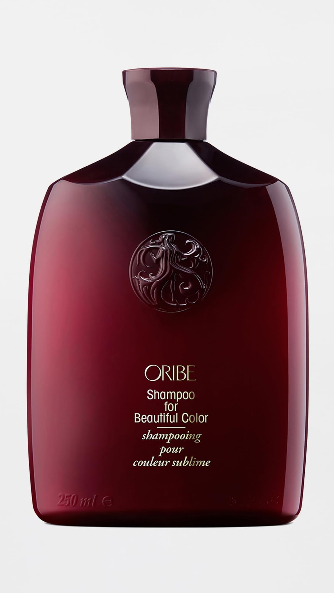 Oribe pump and label close-up showing ingredients and premium design benefit