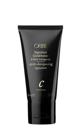 Oribe Signature Conditioner front view shows elegant packaging and premium finish