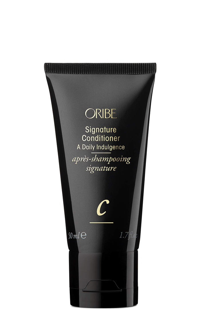 Oribe Signature Conditioner front view shows elegant packaging and premium finish