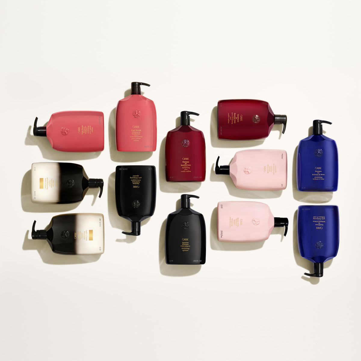 Creamy texture of Oribe signature shampoo on hand illustrating weightless conditioning