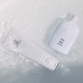 Oribe Silverati cream close-up showing smooth formula and detangling benefit