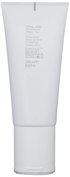 Oribe Silverati conditioner pouring texture highlighting hydration benefit
