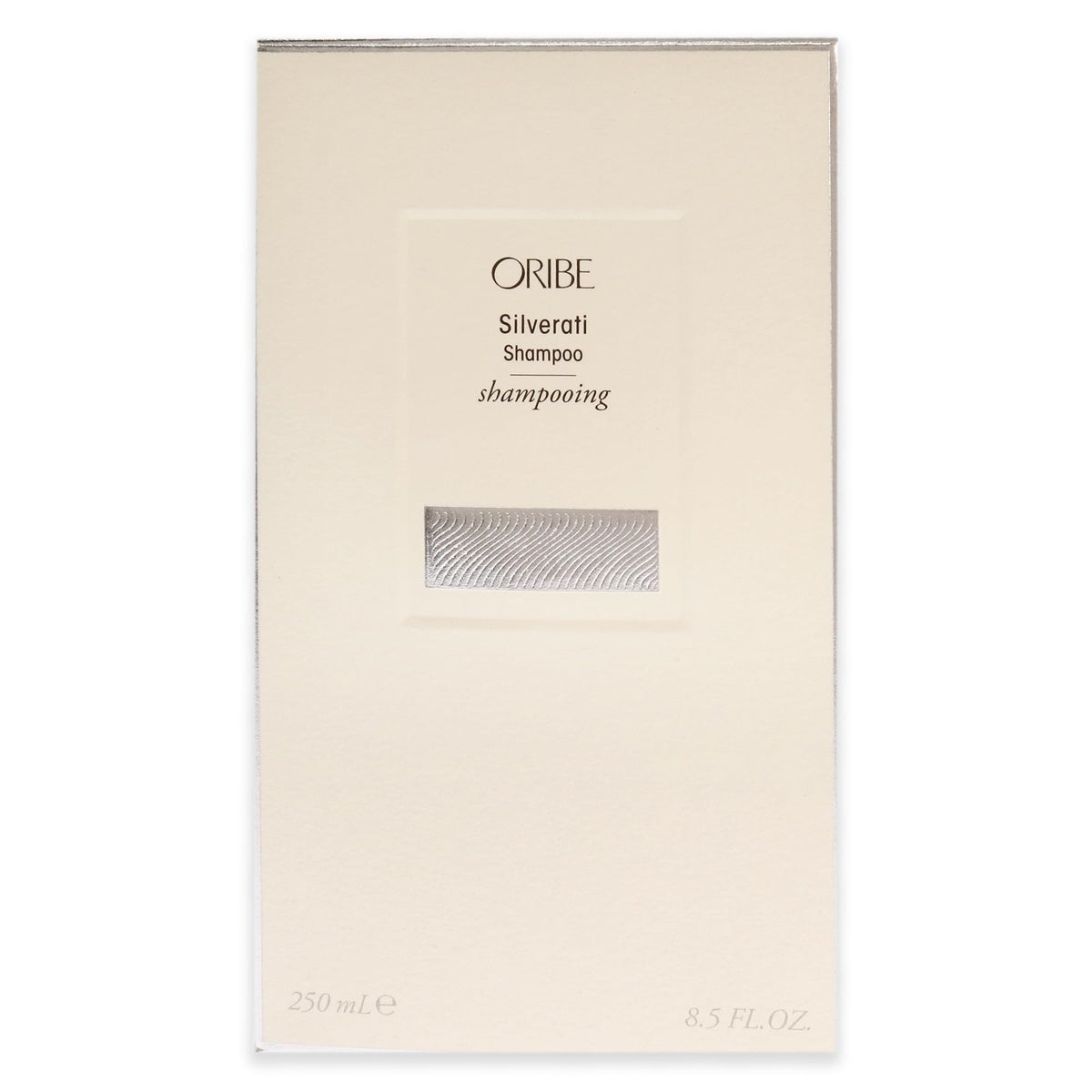 Oribe Silverati bottle next to ruler showing 8.5 oz scale for size