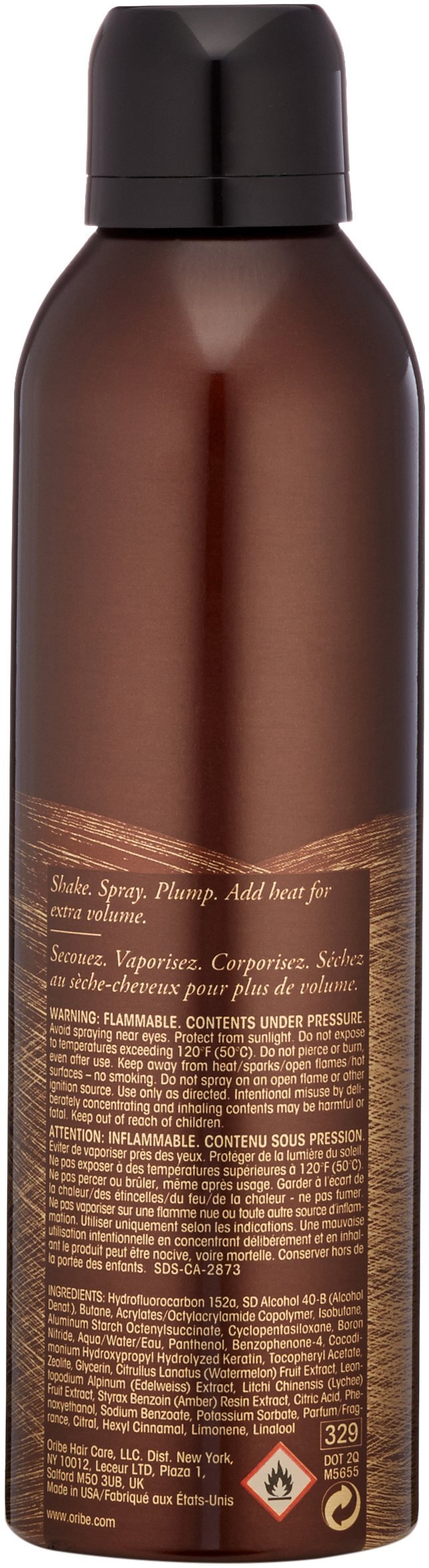 Oribe nozzle close-up demonstrating fine mist spray for controlled application and even coverage