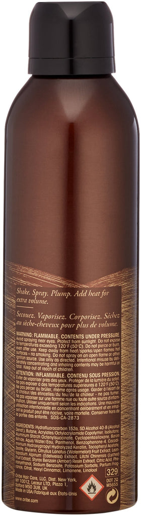 Oribe nozzle close-up demonstrating fine mist spray for controlled application and even coverage