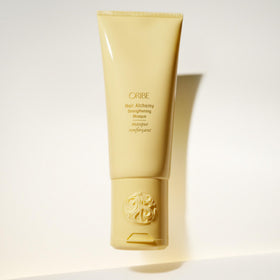 Oribe label close-up showing key claims and scent detail benefit