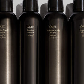 Oribe Superfine on styled hair in lifestyle setting showing long-lasting polish