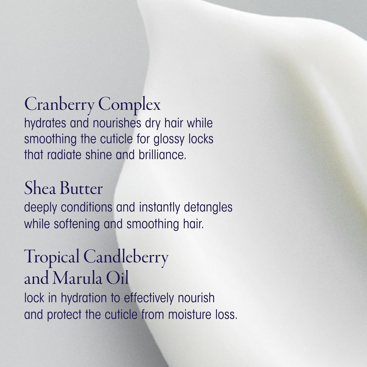 Oribe Supershine being worked through wet hair to show detangling benefit