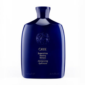ORIBE front packaging showing the shampoo bottle and branding for luxurious shine