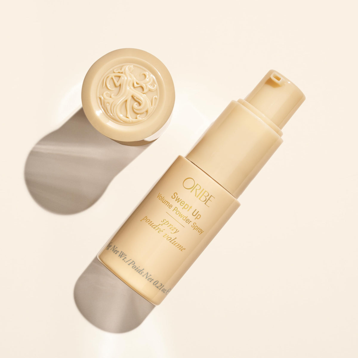 ORIBE bottle beside measuring scale and ingredient callouts for safety