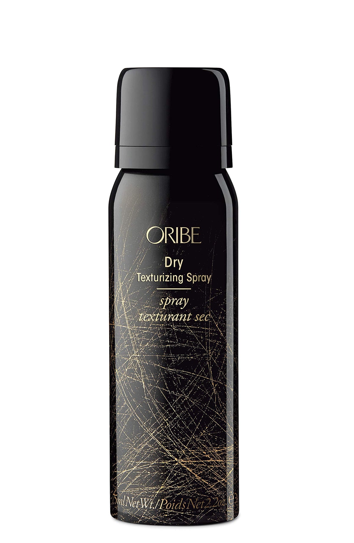 Three Oribe products on a bathroom shelf, travel-ready styling and repair by Oribe