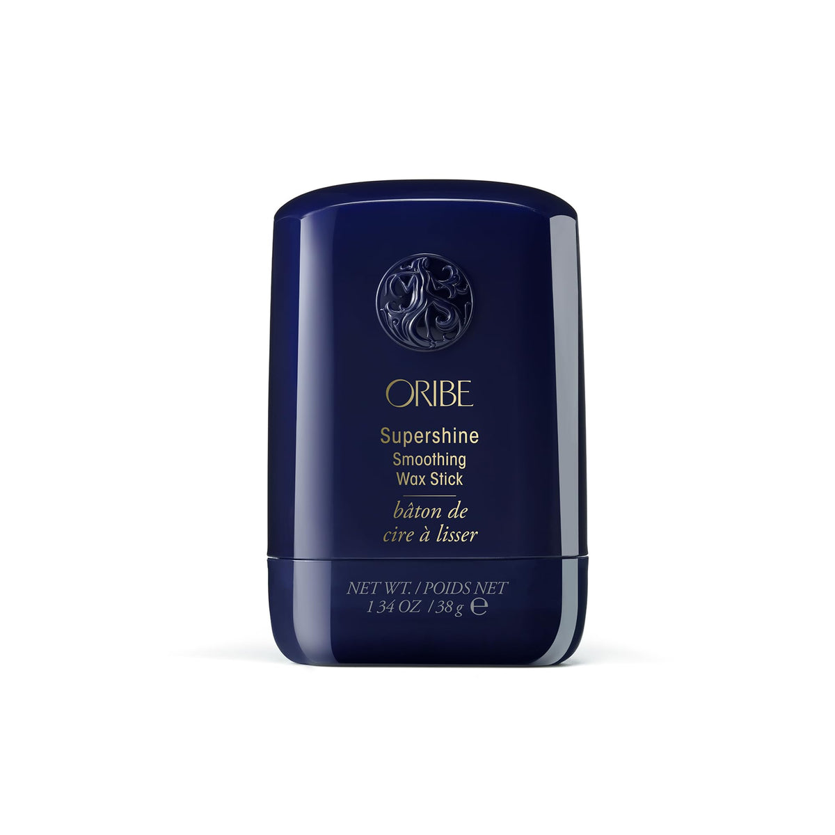 ORIBE front packaging of the Supershine Smoothing Wax Stick shows compact design and brand