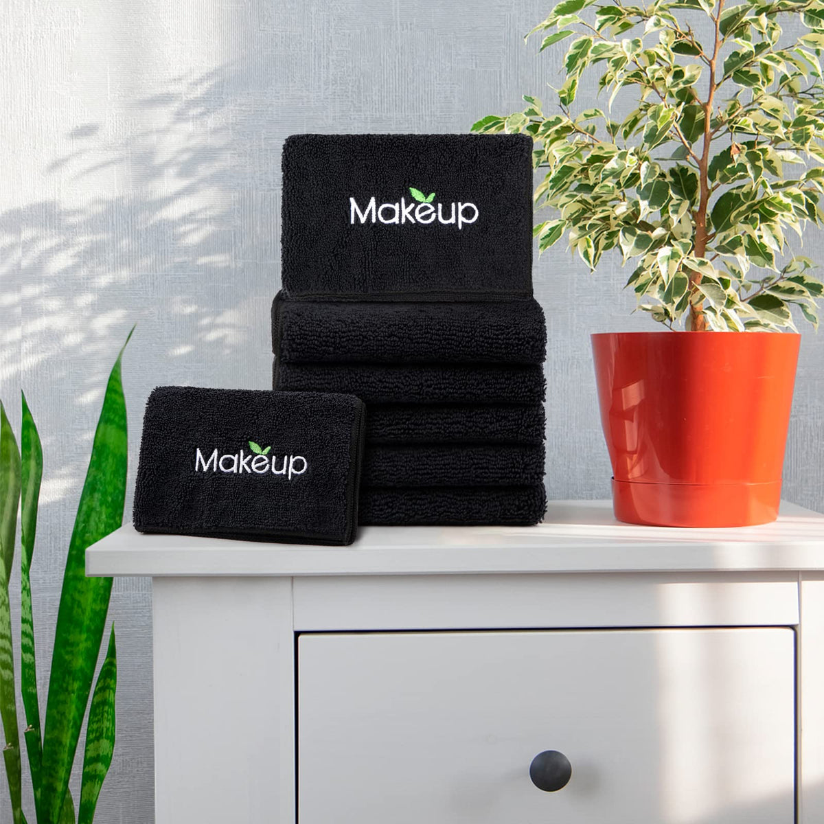 Orighty stacked towels on shelf in guest room highlighting hospitality-ready supply