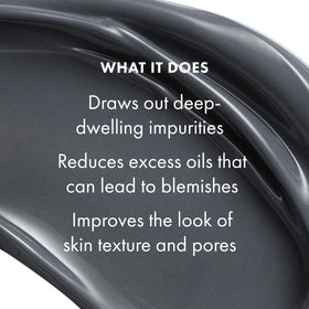 Origins applying mask on model's cheek, showing targeted pore-clearing benefit