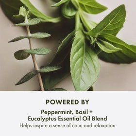 Origins exfoliating scrub texture close-up showing gentle bamboo and walnut particles for smoother skin