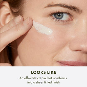 Origins GinZing applied on hand demonstrating blendability and coverage