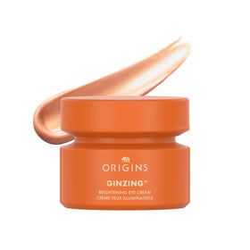 Origins GinZing warm jar front view showing compact design and brightening benefit