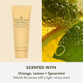 Origins applying hand cream to hands showing immediate softening and non-greasy finish