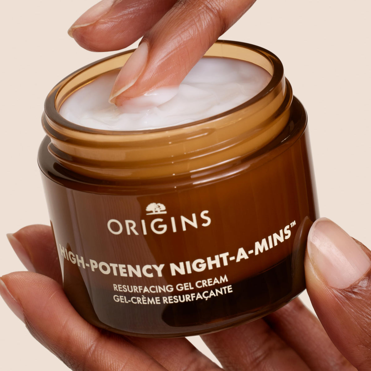 Origins close-up showing jojoba butter beads for conditioning moisture
