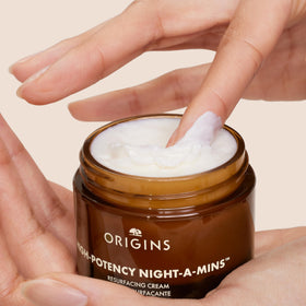 Origins ingredient close-up showing grapes and sugar beets for fruit-derived AHAs benefit