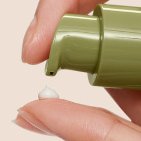 Origins Plantscription cream applied on hand demonstrating easy blend and coverage
