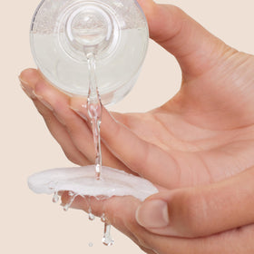 Origins Well Off close-up label highlighting ophthalmologist-tested and vegan claims