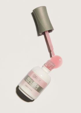 Orly gel applied on a nail tip showing natural-looking extension benefit