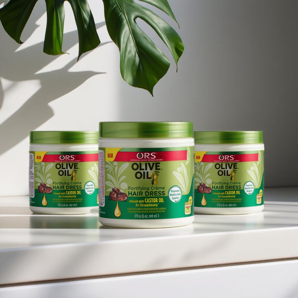 ORS Olive Oil Fortifying Cream applied to braided hair for added shine