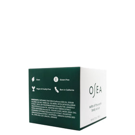 OSEA bathroom scene with scrub and towel conveying a calming spa-like self-care ritual