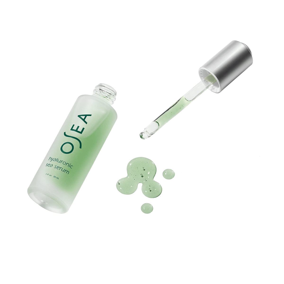 OSEA serum next to moisturizer in bathroom setting for layering benefit
