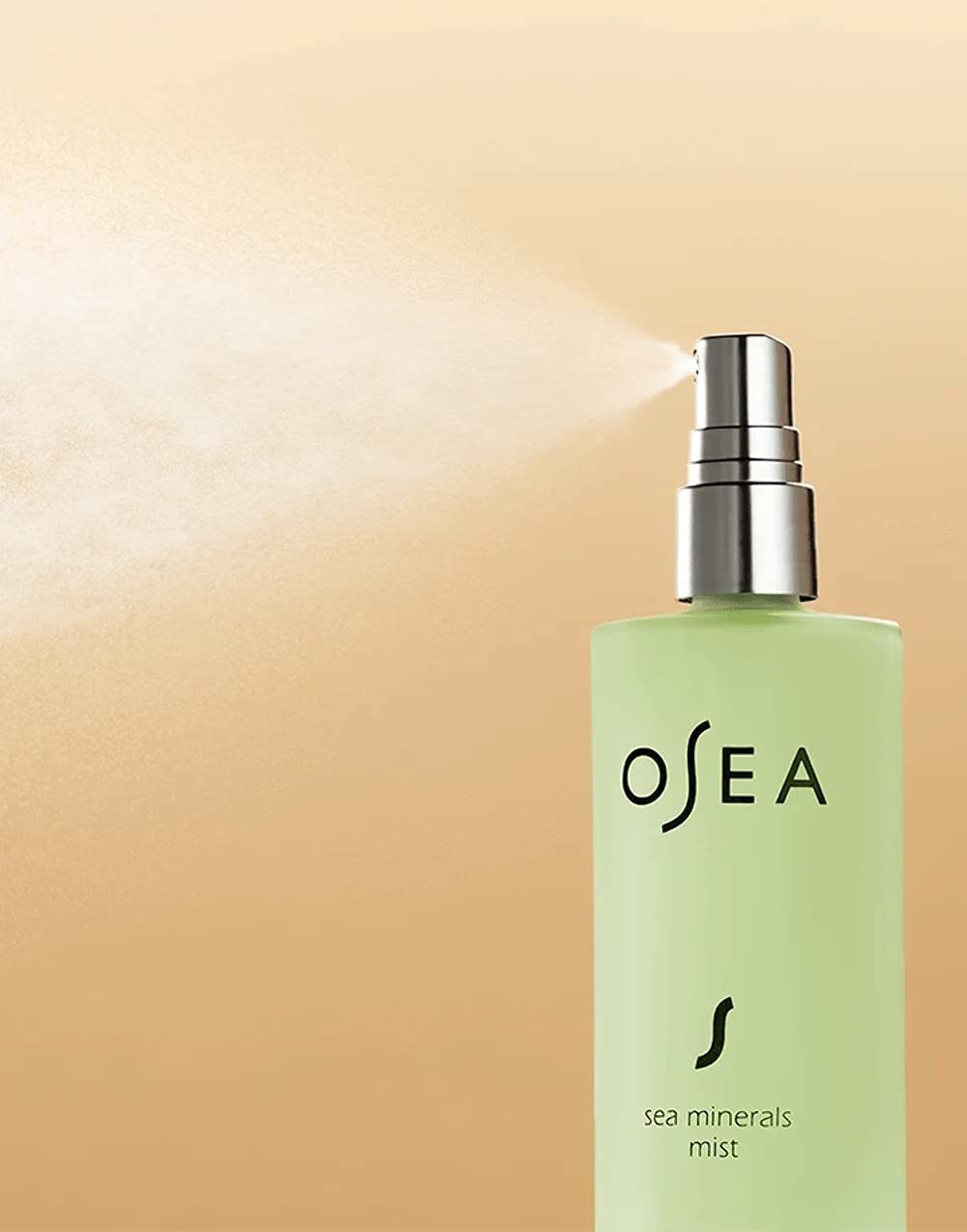 OSEA facial mist sprayed on model showcasing instant refresh