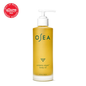 OSEA close view of pump and label highlighting ingredients and ease of use