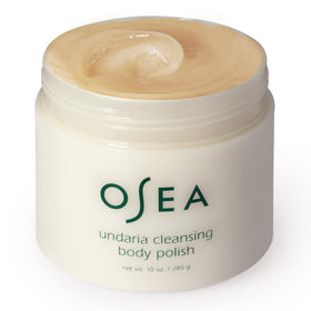OSEA 10oz jar next to common objects to show size and travel-friendly capacity