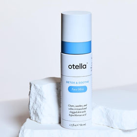 Otella bottle in travel pouch showing portability and on-the-go benefit