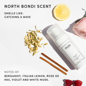 OUAI foam applied to damp wavy hair enhancing natural wave formation