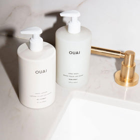 OUAI set styled on bathroom counter for elegant everyday use