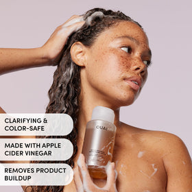 OUAI bundle side-by-side scale showing both bottles’ size and routine simplicity