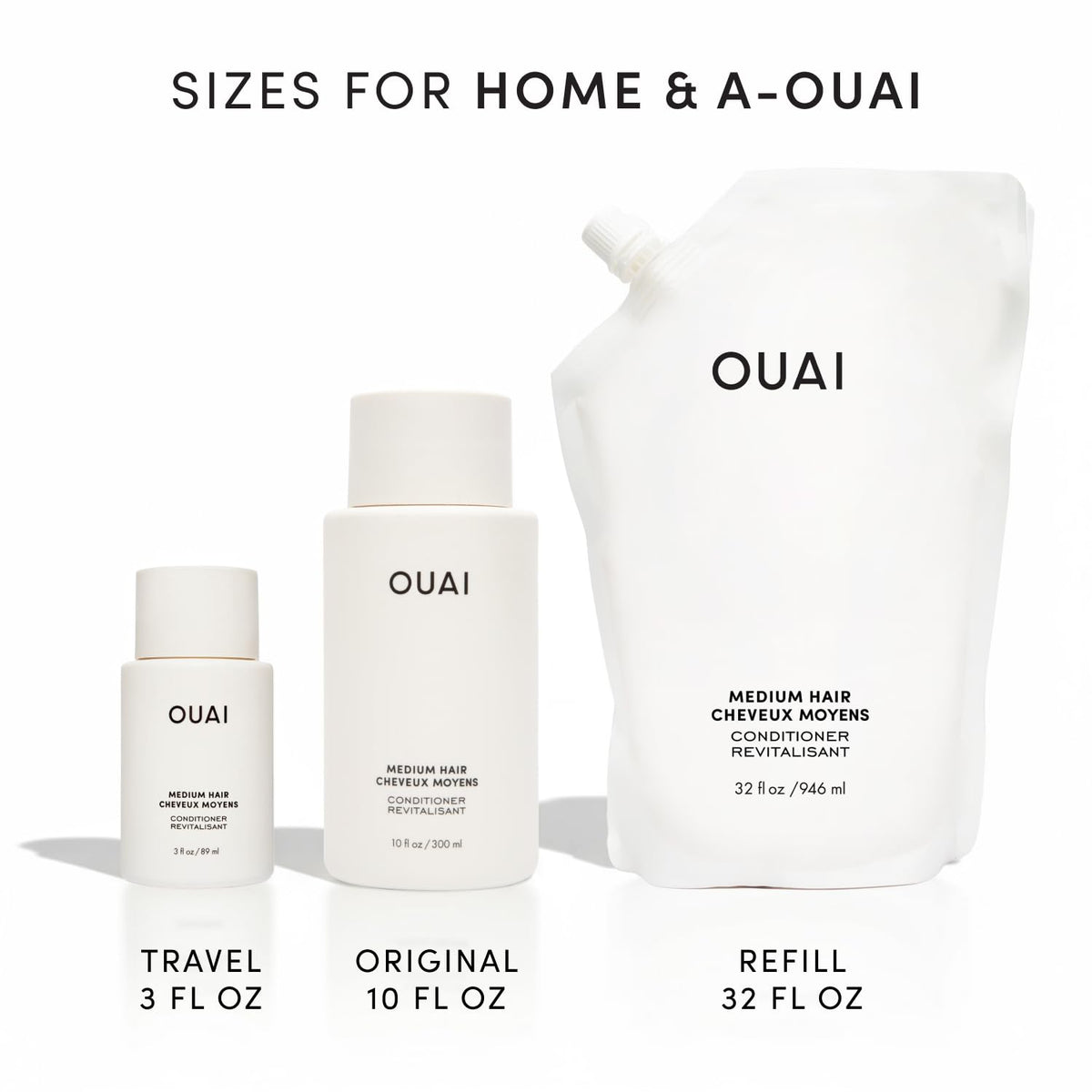 OUAI conditioner held in hand next to coin for size comparison and portability