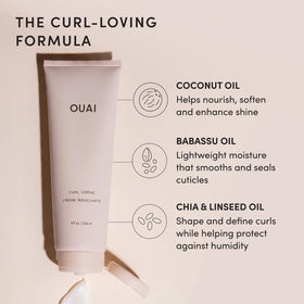 OUAI curl cream dollop on palm showing smooth texture and spreadability