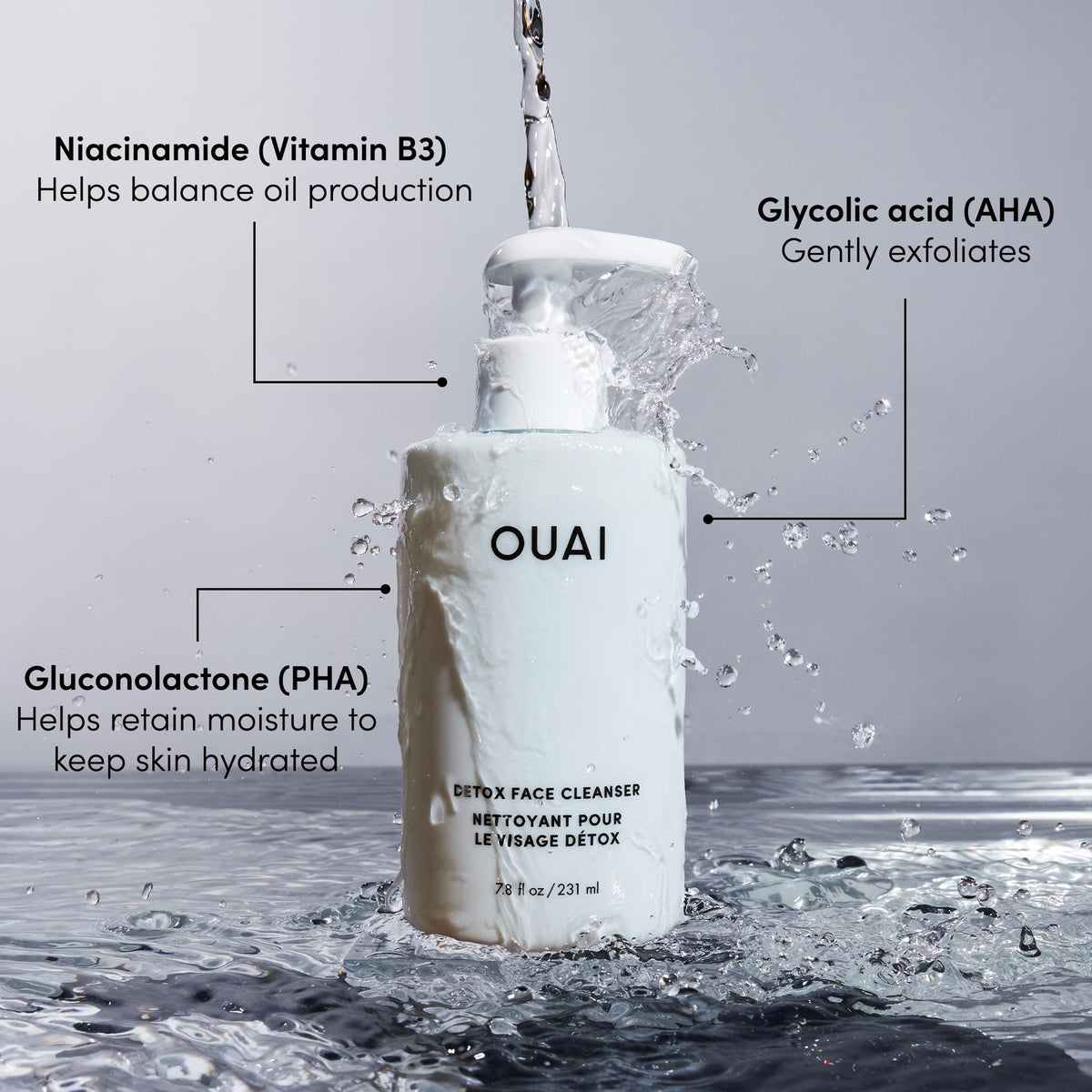 OUAI size comparison in hand to convey 7.8 fl oz scale for travel and storage