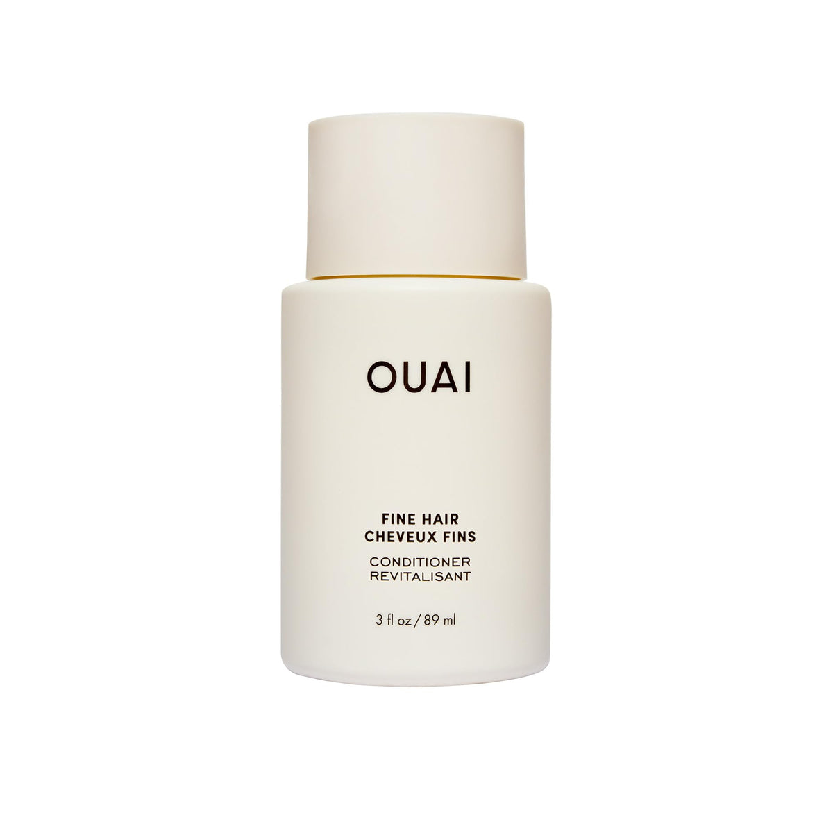 OUAI front packaging of travel conditioner showing bottle and branding, easy-packing benefit