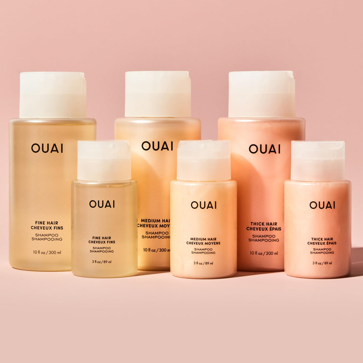 OUAI ingredients display with biotin keratin chia seed oil emphasizing strengthening benefits