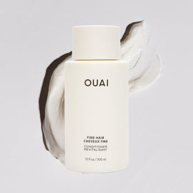 OUAI pump and label detail highlighting ingredients and clear instructions for quick use