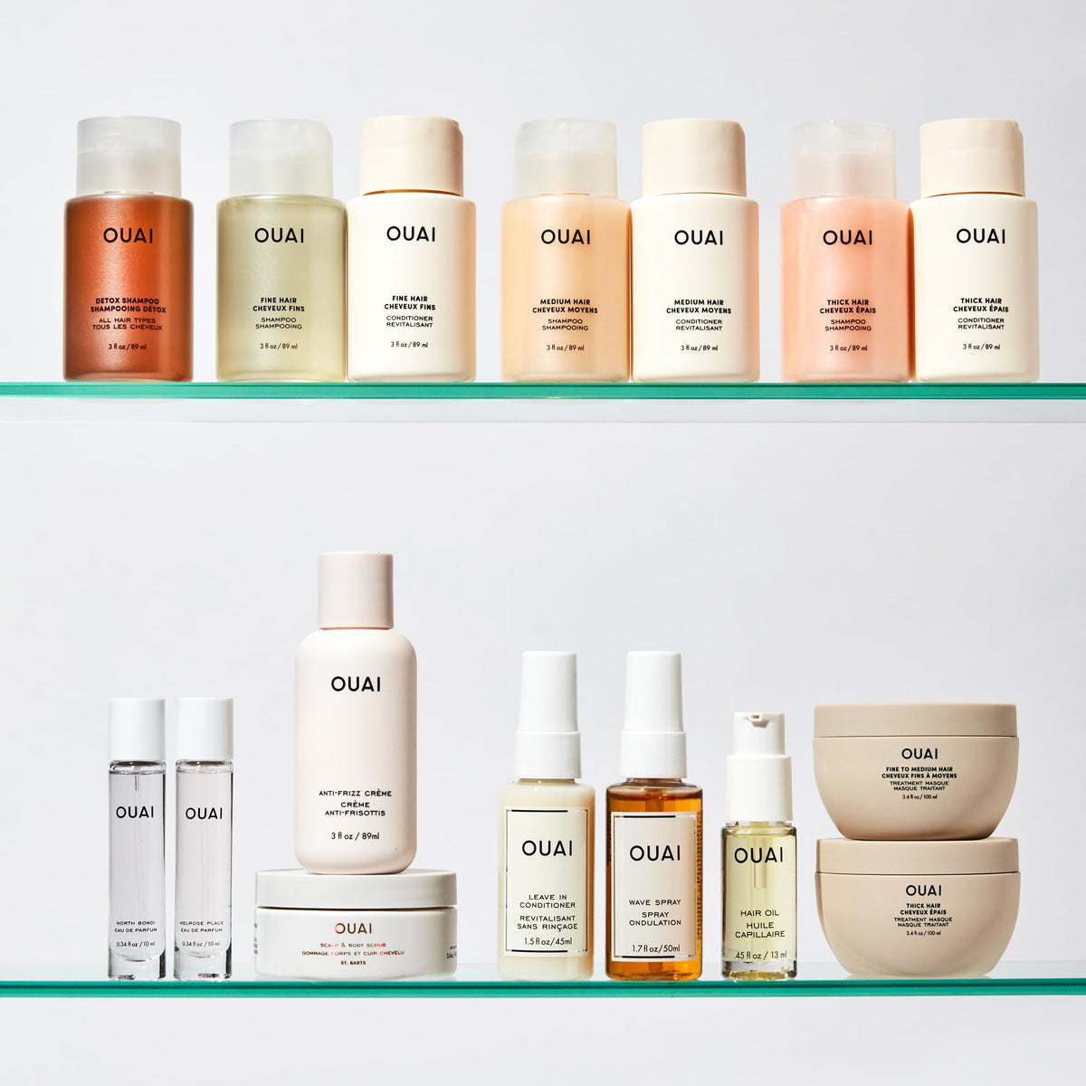 OUAI recyclable bottle and cap emphasizing sustainable packaging and easy recycling