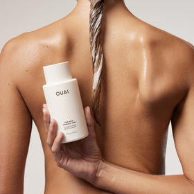 OUAI conditioner texture swatch highlighting lightweight creamy consistency