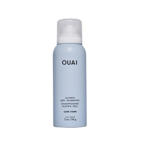 OUAI front packaging of 2 oz travel dry shampoo showing compact can and branding for easy carry