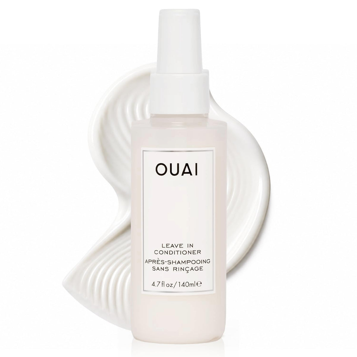 OUAI front spray bottle displayed, shows packaging and travel-ready size