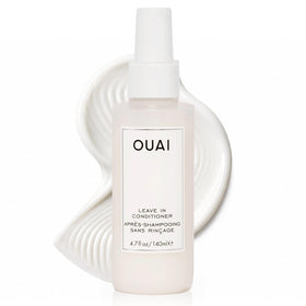 OUAI front spray bottle displayed, shows packaging and travel-ready size