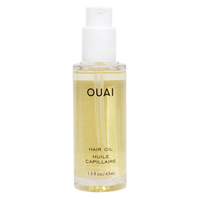 OUAI bottle front view showing sleek design and product benefit